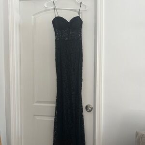 Black Masquerade long gown with high slit: Size 7-8
